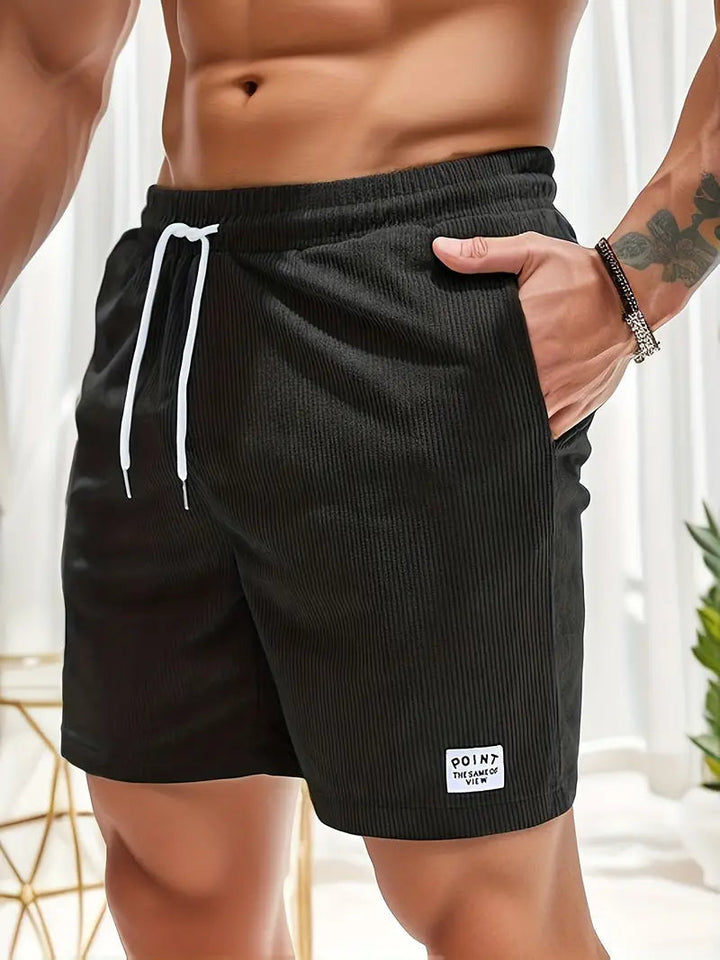 Sportieve heren zwemshort met trendy design en elastische taille, perfect voor een stijlvolle zomerdag.