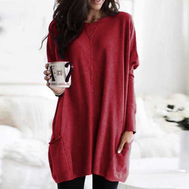 Modieuze lange trui voor dames met zakken, ideaal voor een trendy herfst- of winterlook.