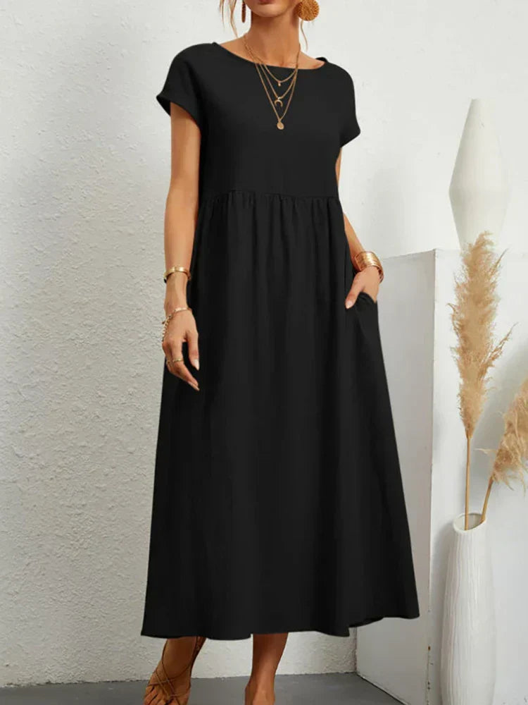 "Comfortabele vintage O-hals zomerjurk van ademend katoen, ideaal voor zomerse dagen; veelzijdige elegante stijl."