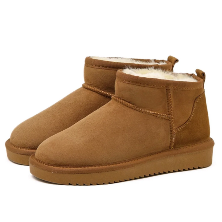 Comfortabele, warme dames winterlaarzen. Zwarte slip-on boots voor casual wintermode.