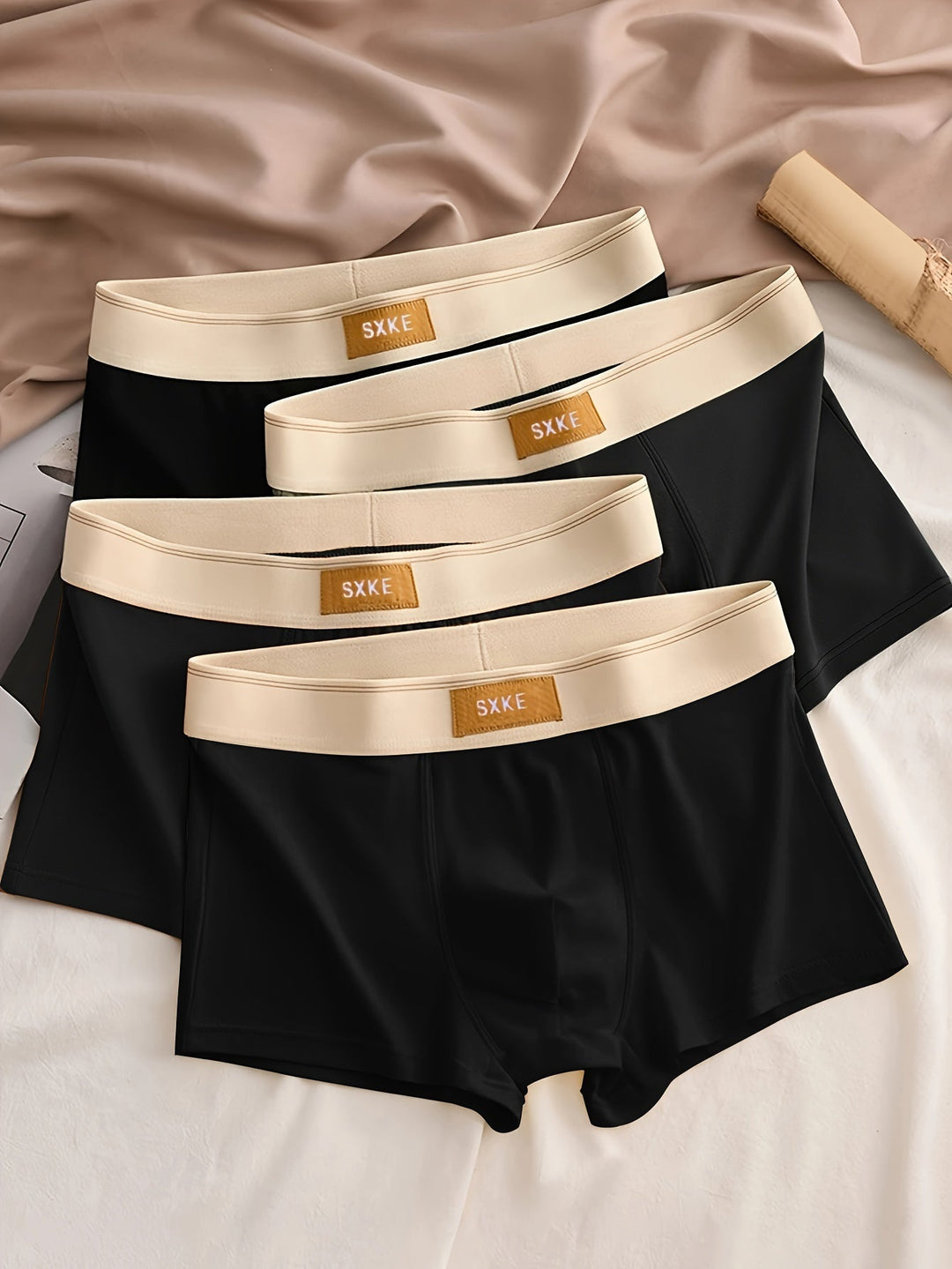 Detail van de zachte stof van comfortabele heren boxershorts 4-pack. Zwart ondergoed voor optimale pasvorm.