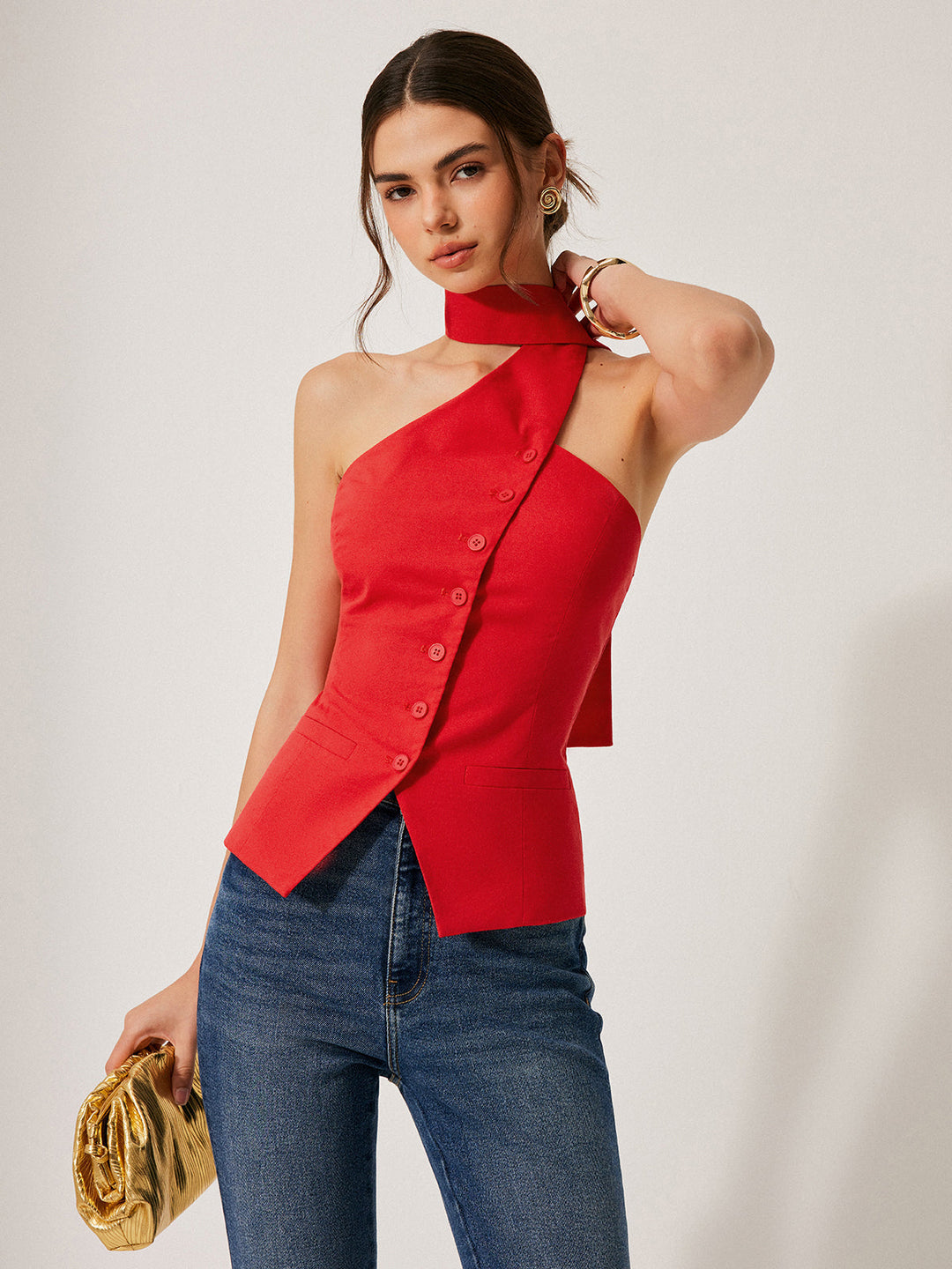 Mouwloze halternek vesttop voor dames met asymmetrische zoom, perfect als casual of feesttop.
