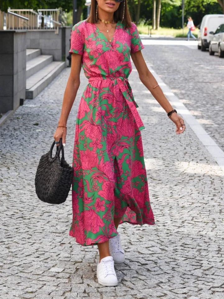 Dames bloemen wrap midi jurk in roze en groen kleurstelling