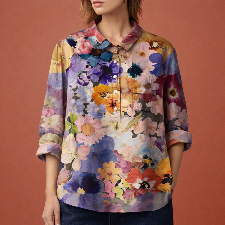 Elegante dames bloemenprint blouse met lange mouwen en kraag, geschikt voor zakelijke en casual settings.