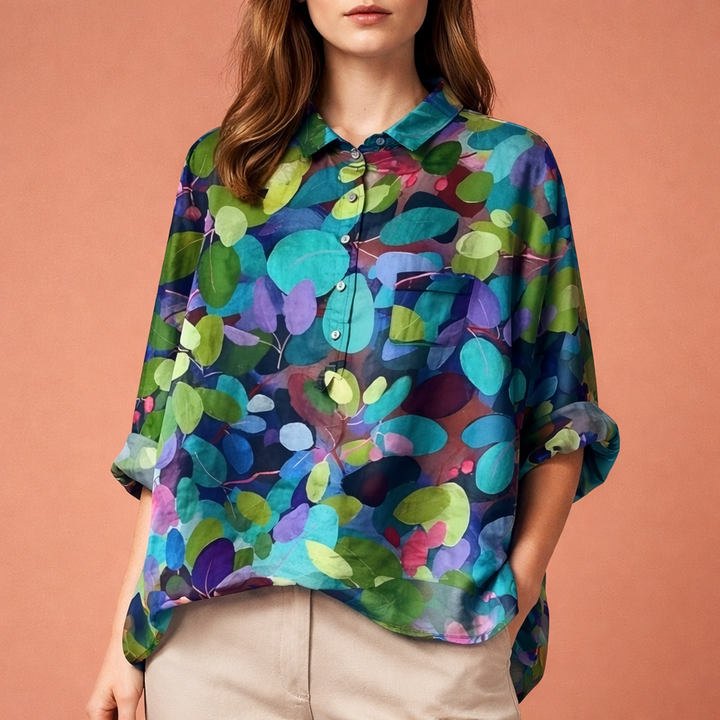 Lente/zomer dames blouse met vrolijke bloemenprint, lange mouwen en stijlvolle kraag.