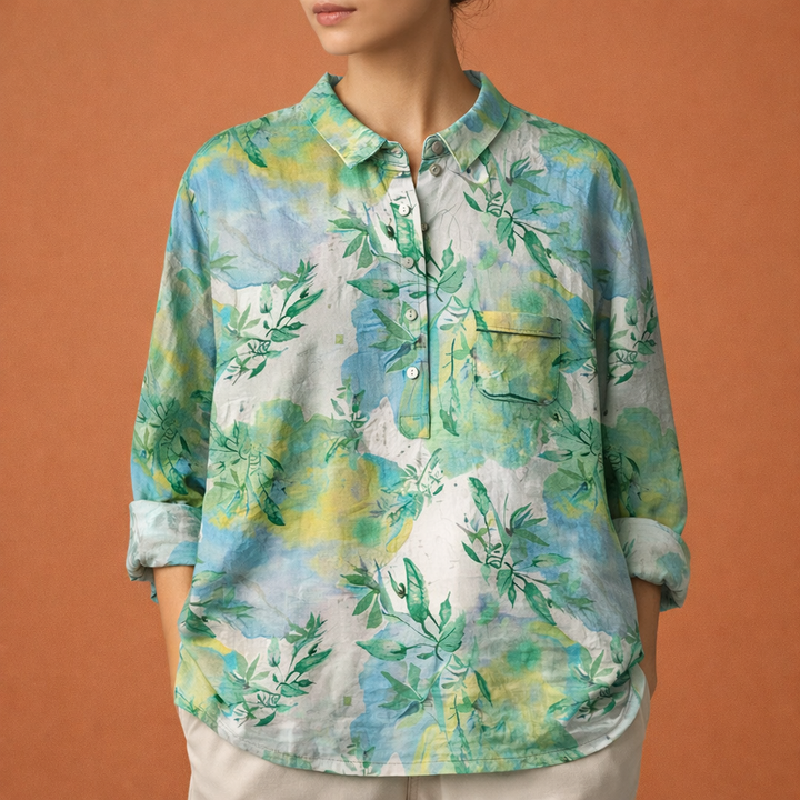 Gedetailleerde dames bloemenprint blouse met lange mouwen en kraag, verkrijgbaar in diverse kleuren.