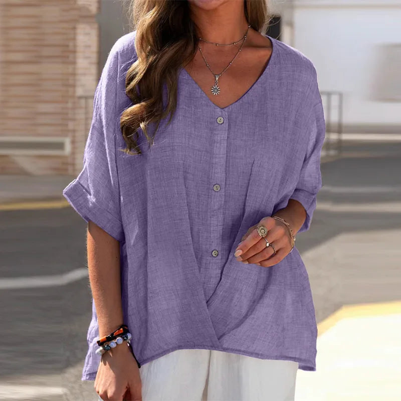 Dames blouse V-hals, oprolmouwen. Comfortabele, elegante top voor lente/zomer. Veelzijdig casual of zakelijk.