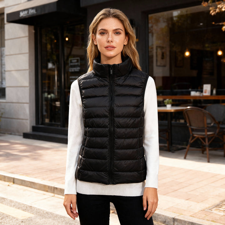 Dames bodywarmer met elegante kraag en slank silhouet, ideaal voor herfst & wintermode.