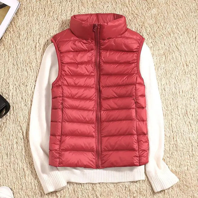Stijlvolle dames bodywarmer, accentueert een slank figuur. Perfect voor herfst & winter laagjes.