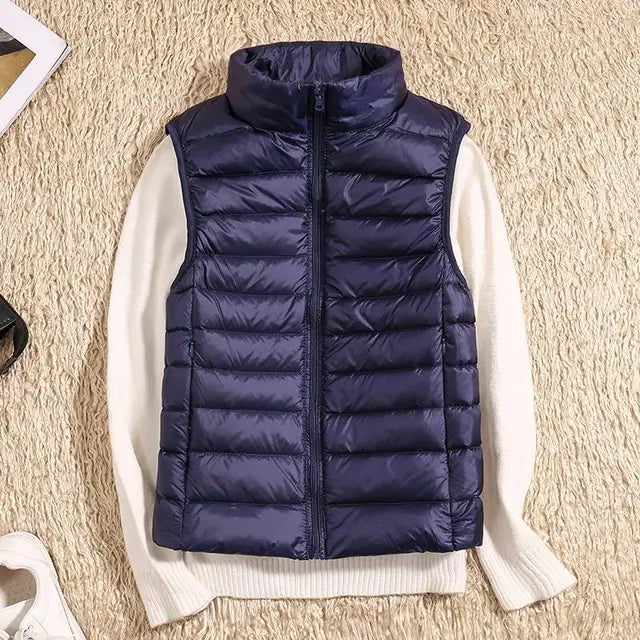 Zwarte dames bodywarmer, elegant ontwerp met hoge kraag. Veelzijdig voor een casual chic look.