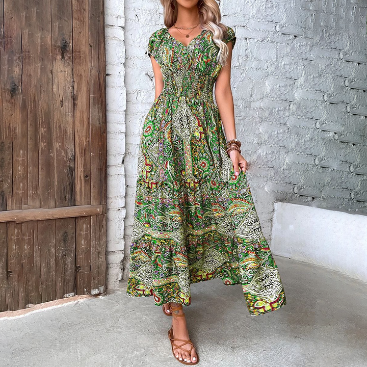 Trendy dames boho maxi jurk met losse, vloeiende pasvorm, geschikt voor diverse zomerse looks.
