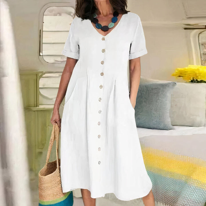 Perfecte zomerjurk voor dames, casual, met V-hals, A-lijn en speelse knoopjes.