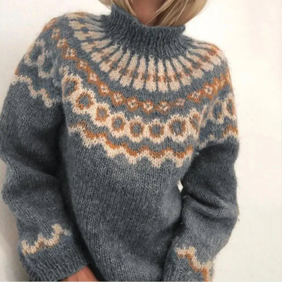 Dames coltrui met klassiek Noors patroon, ideaal voor warme en stijlvolle winterdagen. Comfortabele gebreide trui.