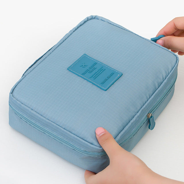 Reisorganizer voor dames: waterdichte make-up tas met extra mini cosmetica etui.