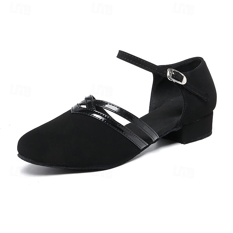 "Dames dansschoenen, comfortabel, flexibel voor moderne dans, elegante lage hak, ronde teen, zwarte afwerking."