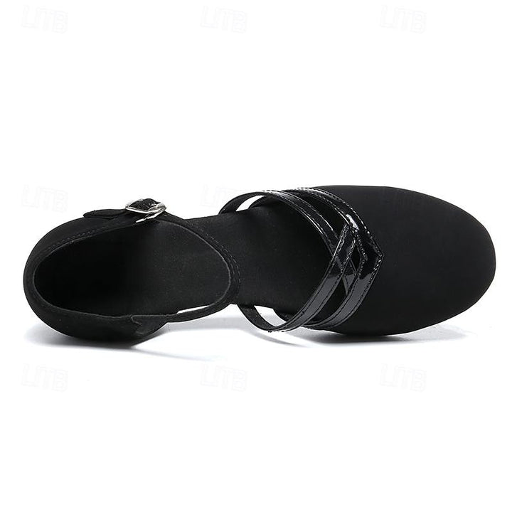 "Dames dansschoenen, comfortabel, flexibel voor moderne dans, elegante lage hak, ronde teen, zwarte afwerking."