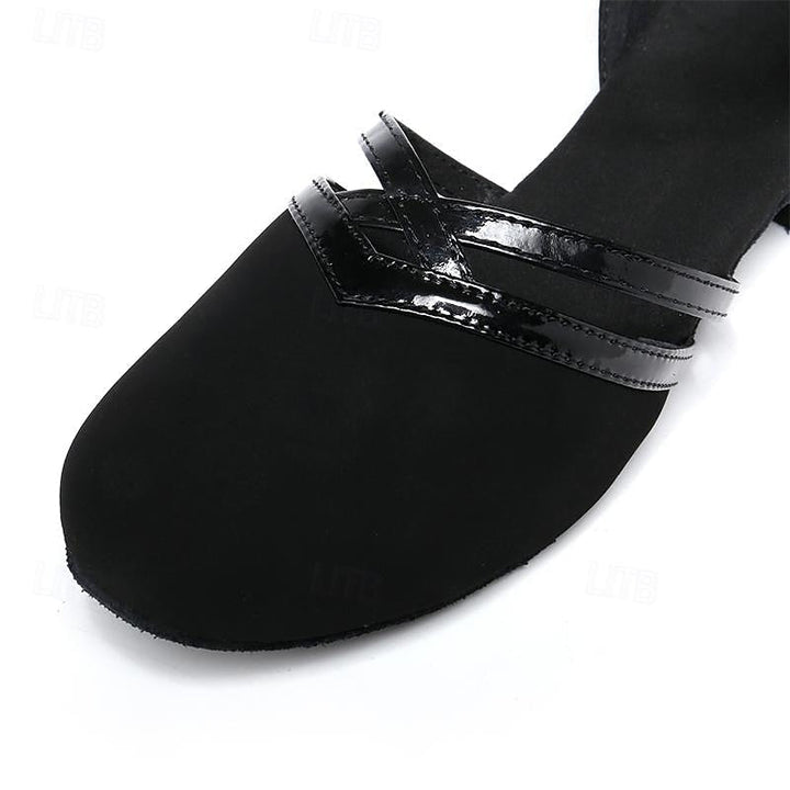 "Dames dansschoenen, comfortabel, flexibel voor moderne dans, elegante lage hak, ronde teen, zwarte afwerking."
