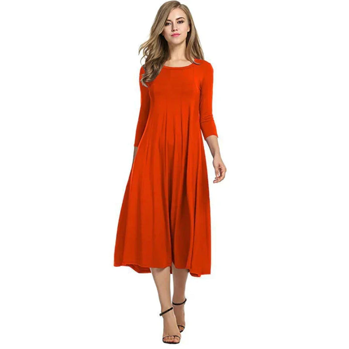 Trendy zomermode: comfortabele driekwart midi jurk voor dames. Stijlvol, veelzijdig en elegant voor de zomer.