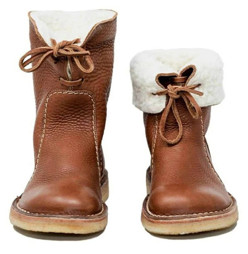 Dames enkellaarzen met veters en warme voering. Comfortabele winterlaarzen, modieus en vintage stijl.