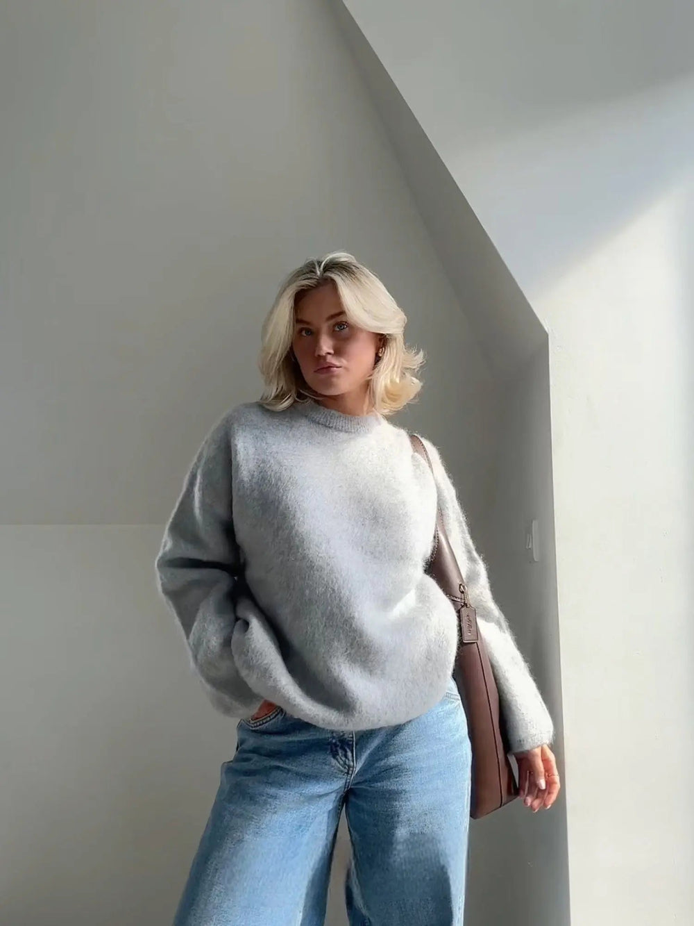 Elegante bordeauxrode gebreide damestrui. Chique en comfortabele dames sweater voor modieuze looks.