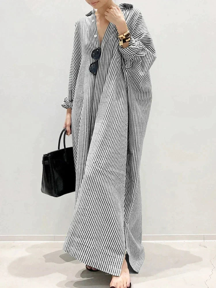 Zomerse casual gestreepte maxi jurk voor dames; een must-have voor een ontspannen, modieuze stijl.