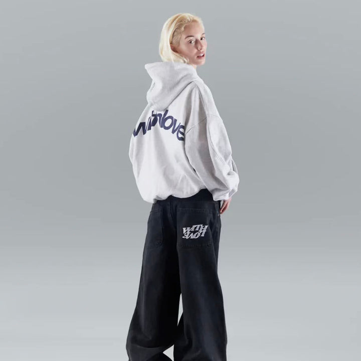 Zwarte dames hoodie Althéon, veelzijdig en comfortabel, perfect voor diverse vrouwenkledingstijlen.