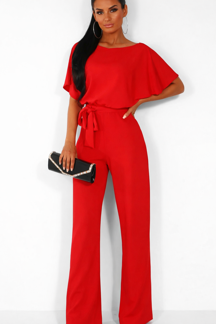 Veelzijdige dames jumpsuit met strikceintuur, korte mouwen en ronde hals. Van casual tot chic.