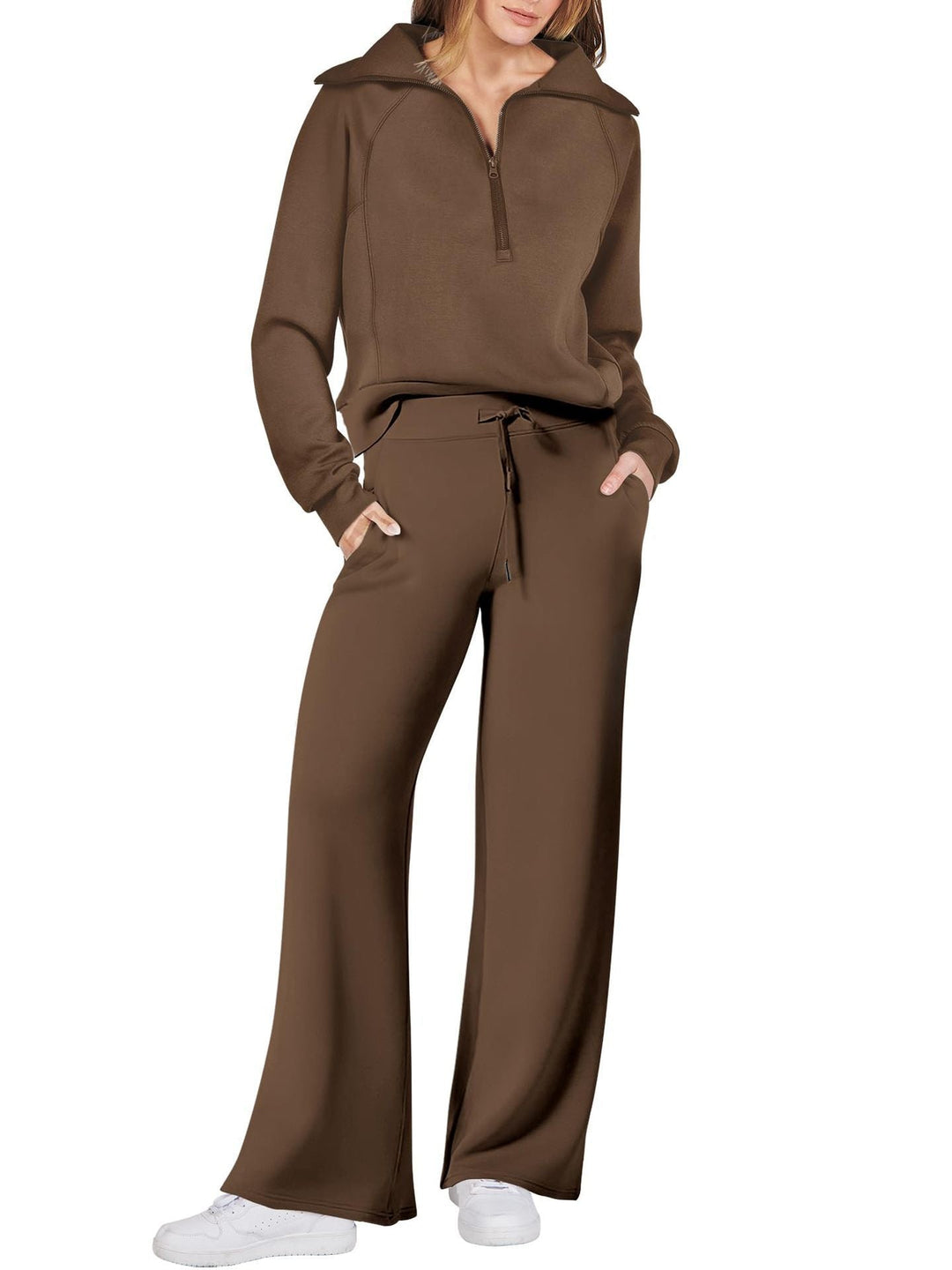 Ontspannen dames lounge set, lange mouwen, ritssluiting, zachte stof, perfecte thuisoutfit.