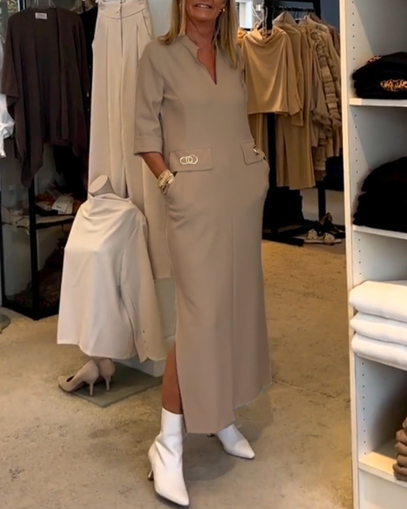 Trendy dames maxijurk, V-hals en zakken, draagbaar als casual of elegante jurk.