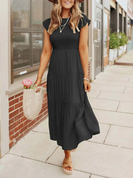 Zomerse dames midi jurk met vlindermouwen, comfortabel en modieus voor dagelijks gebruik.