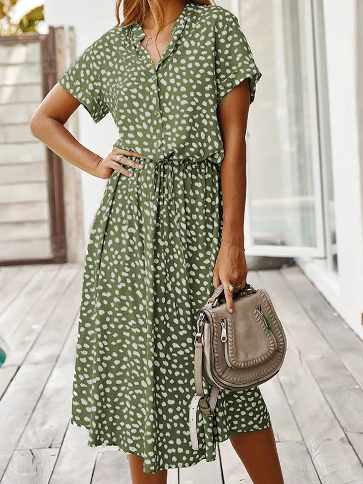 Elegante midi jurk voor dames, met korte mouwen, comfortabel en geschikt voor diverse gelegenheden.