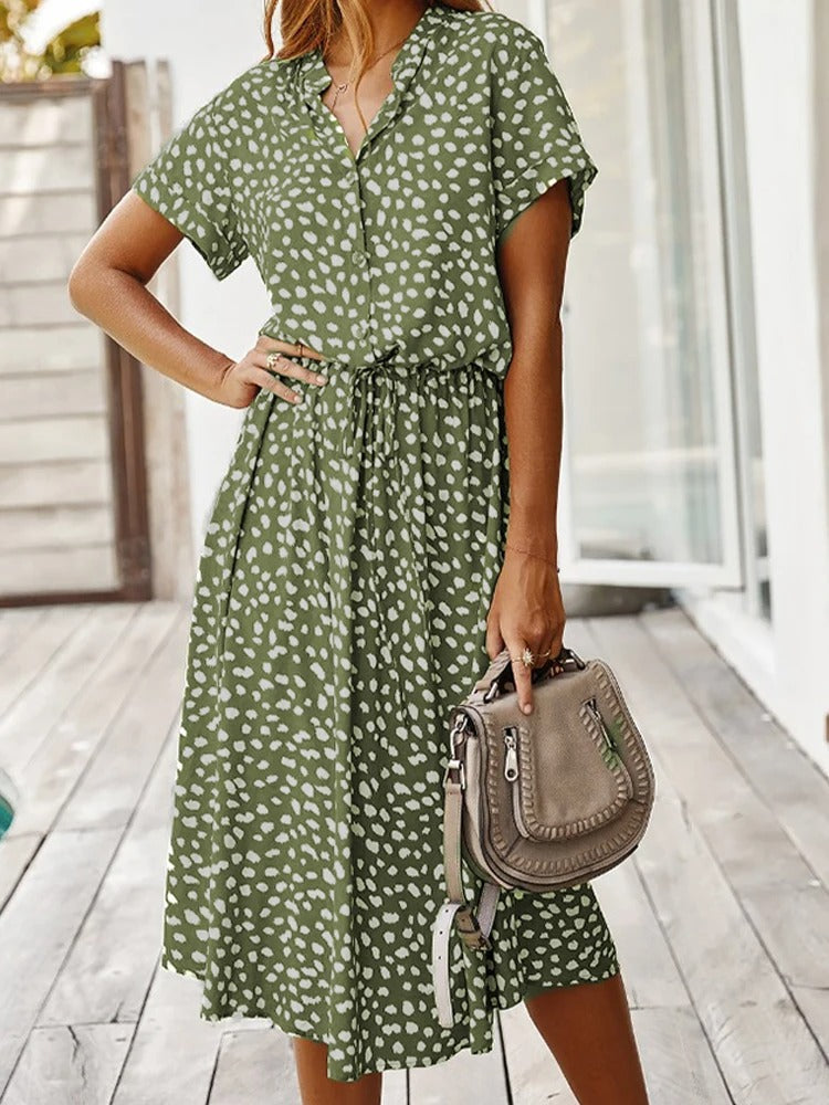 Midi damesjurk met korte mouwen, stijlvol en veelzijdig, essentieel voor je zomergarderobe.