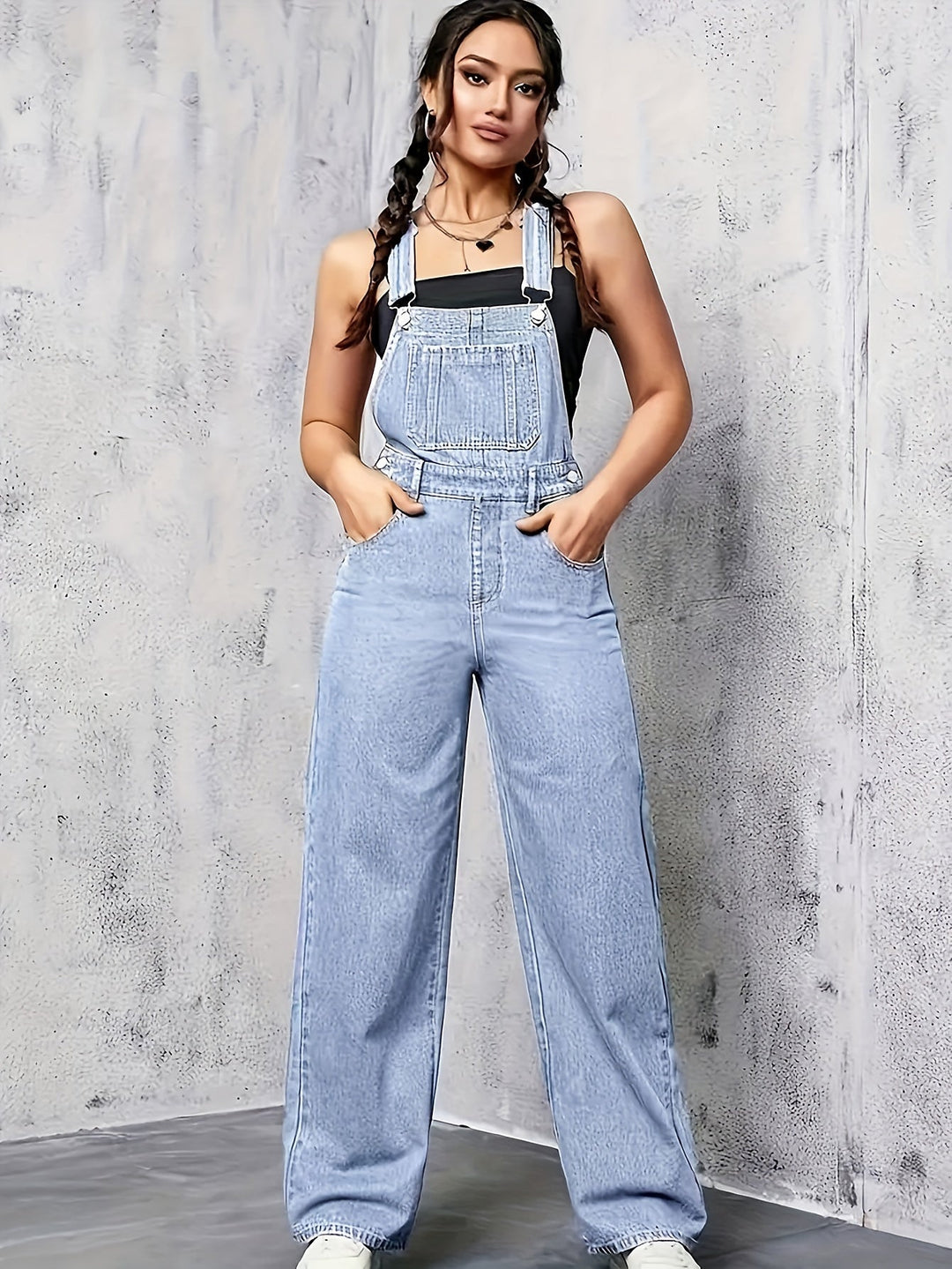Trendy mouwloze spijkeroverall voor dames met wijde pijpen, perfect voor een comfortabele en modieuze zomerlook.