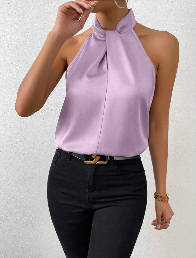 Zomertop met knoop voor dames, mouwloos en chique, voor een modieuze en vloeiende look.