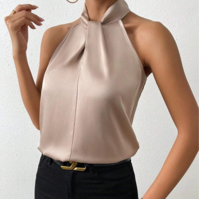 Dames mouwloze haltertop met elegante knoop, ideaal voor zomer en kantooroutfits.