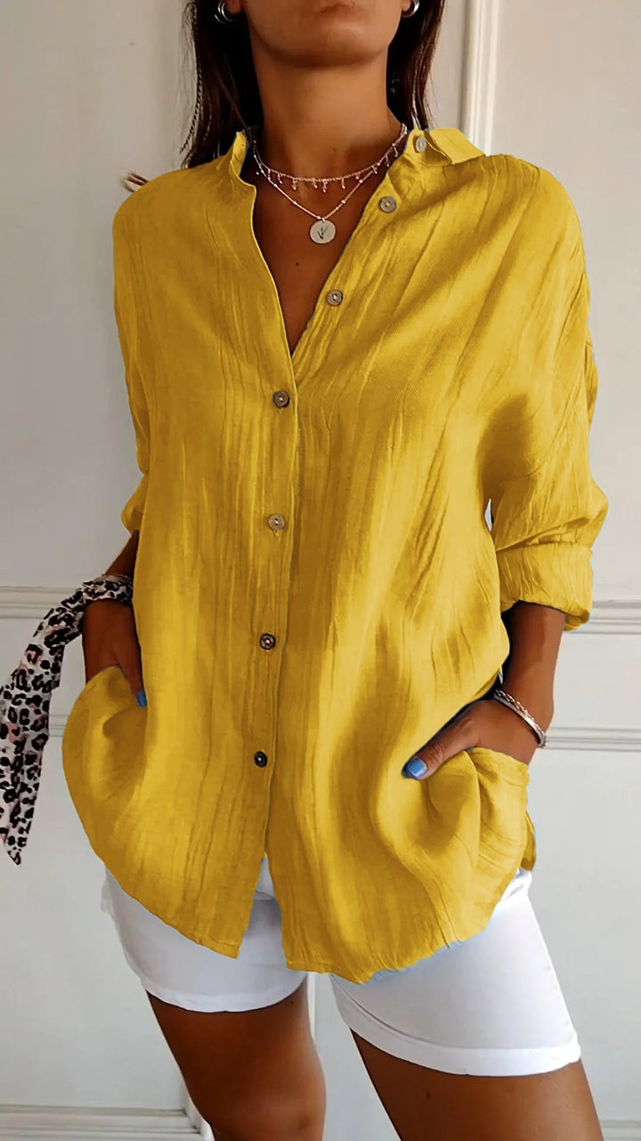 Damesblouse met lange mouwen, oversized pasvorm, zijzakken. Geschikt voor casual en trendy look.