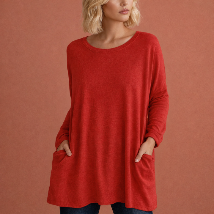 Dames oversized tuniek met zakken, lange comfortabele top voor casual herfst- of winterlook. Losvallend en stijlvol.