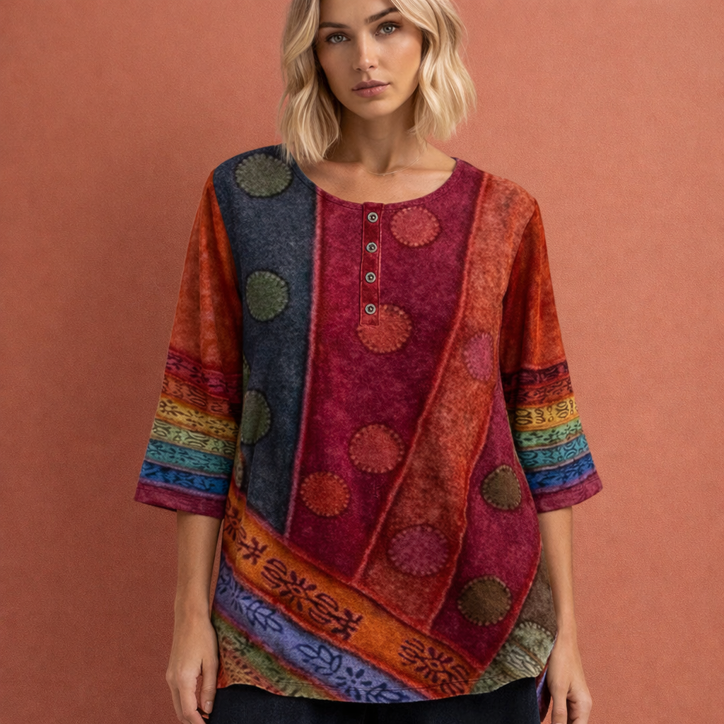 Dames oversized zomertop met vrolijke, kleurrijke print. Perfect voor een casual lente of zomerlook.