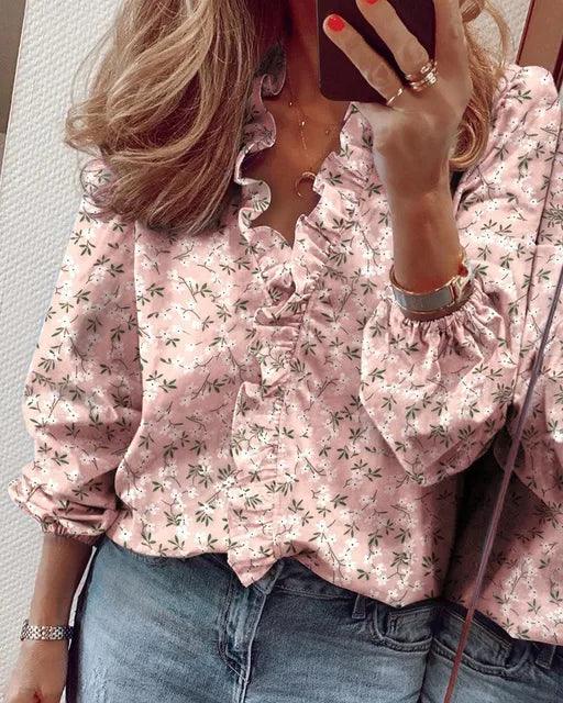 Modieuze dames rucheblouse met V-hals en lange mouwen. Veelzijdige top voor lente, zomer, herfst, winter damesmode.