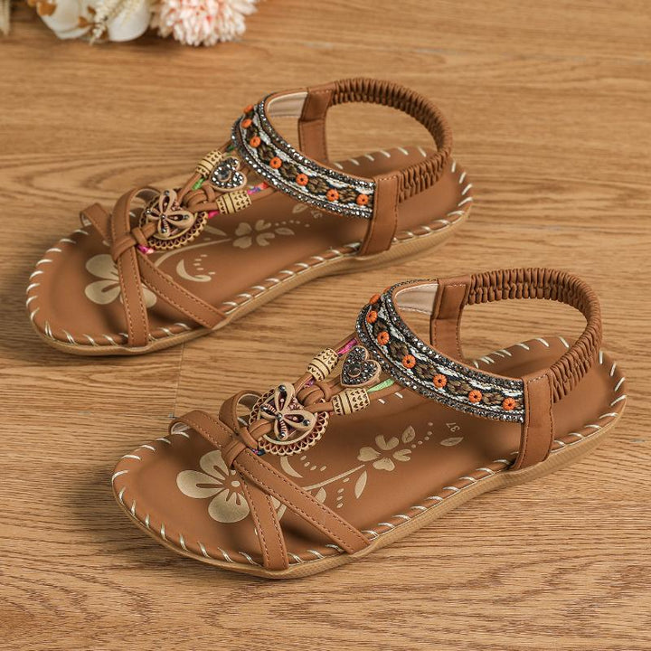 Stijlvolle vrouwen sandalen met platte zool en comfortabele elastische band, perfect voor lange zomerdagen.
