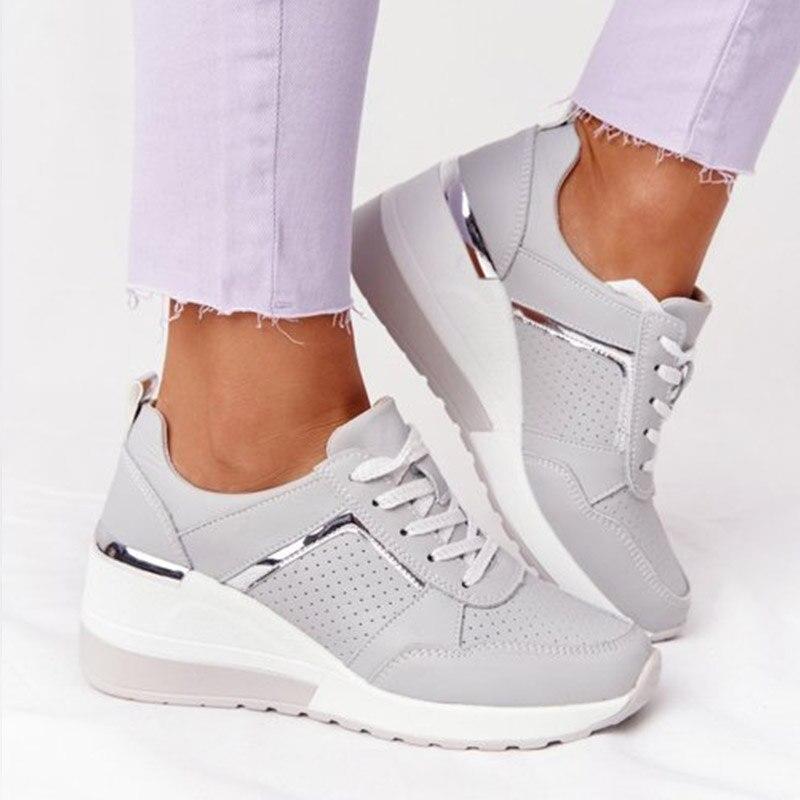 Comfortabele dames sneakers met ondersteunende, versterkte zool en demping voor veelzijdig en sportief gebruik.