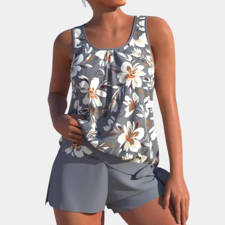 "Dames tankini badpak met kleurrijke print en draadloze beka, met bijpassende play shorts voor comfort en stijl."