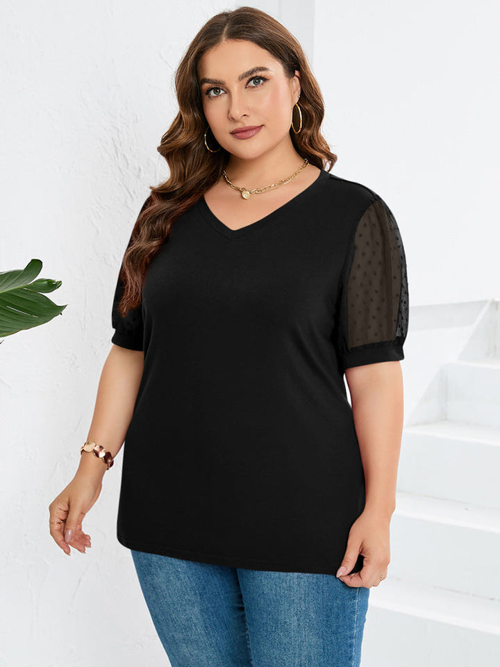 Voorjaars dames top met elegante V-hals en pofmouwen, een casual chic keuze voor elke stijlvolle vrouw.