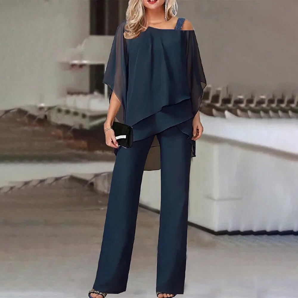 Dames tweedelige zomeroutfit: elegante top & comfortabele luchtige broek. Perfect voor casual dagen.