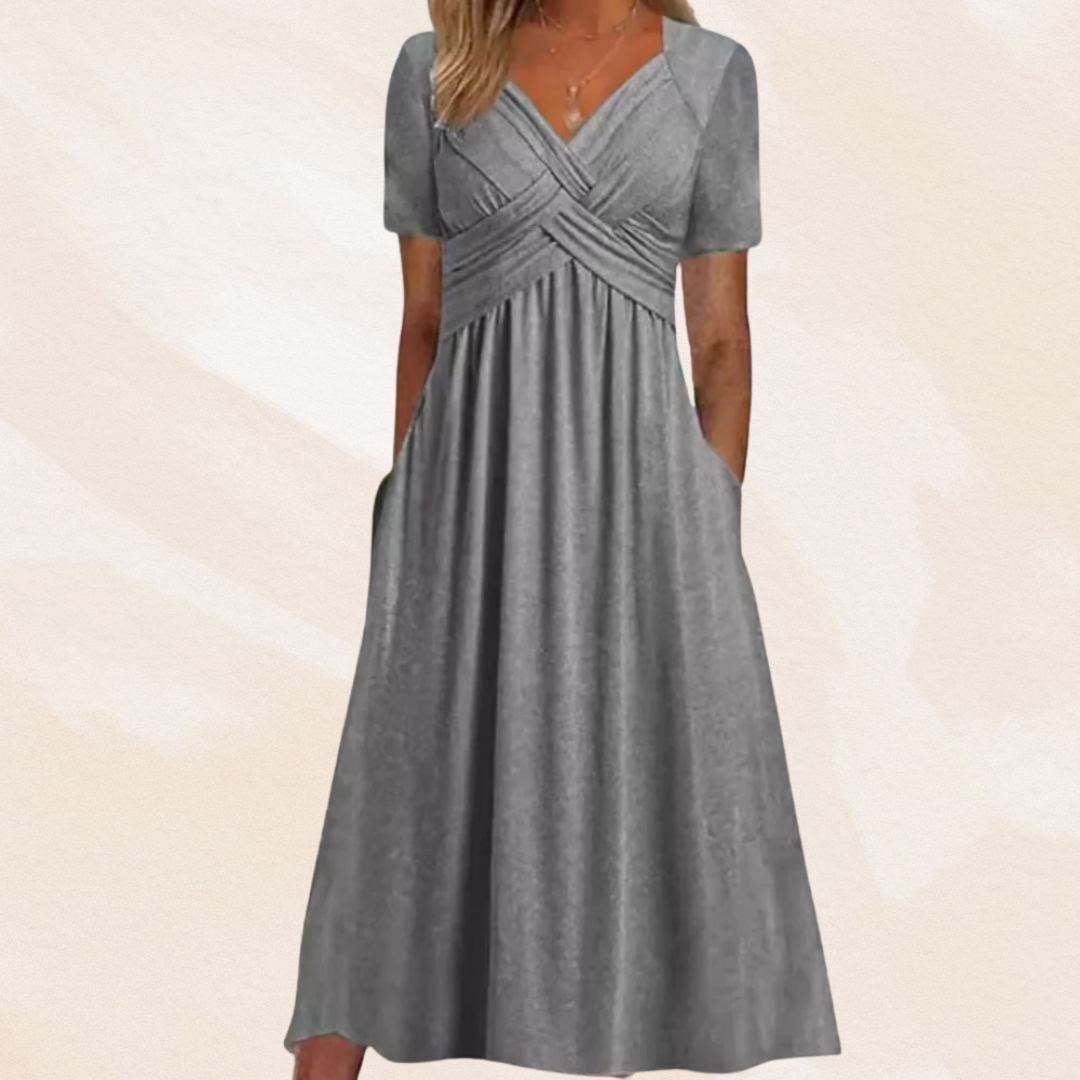 Stijlvolle elegante dames midi-jurk, V-hals en A-lijn, geschikt als zomerjurk of feestelijke jurk.
