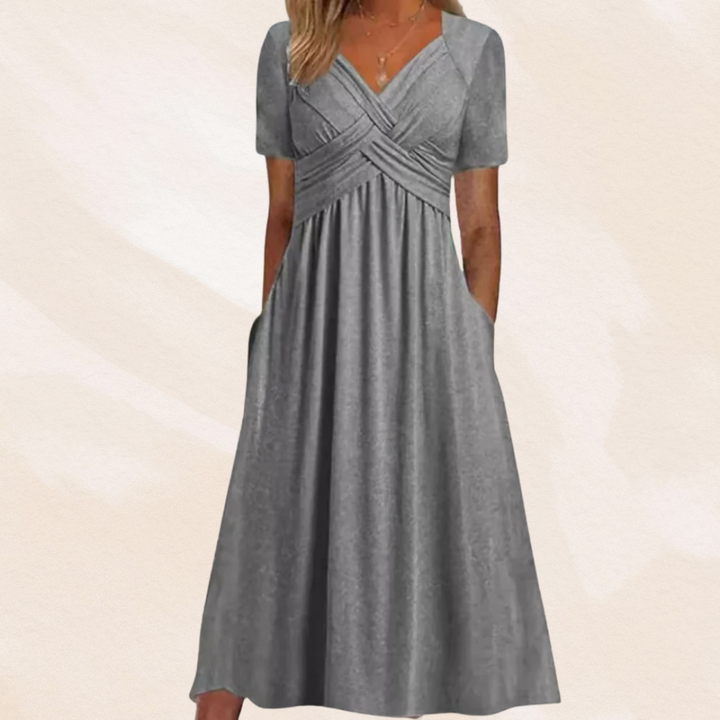 Stijlvolle elegante dames midi-jurk, V-hals en A-lijn, geschikt als zomerjurk of feestelijke jurk.
