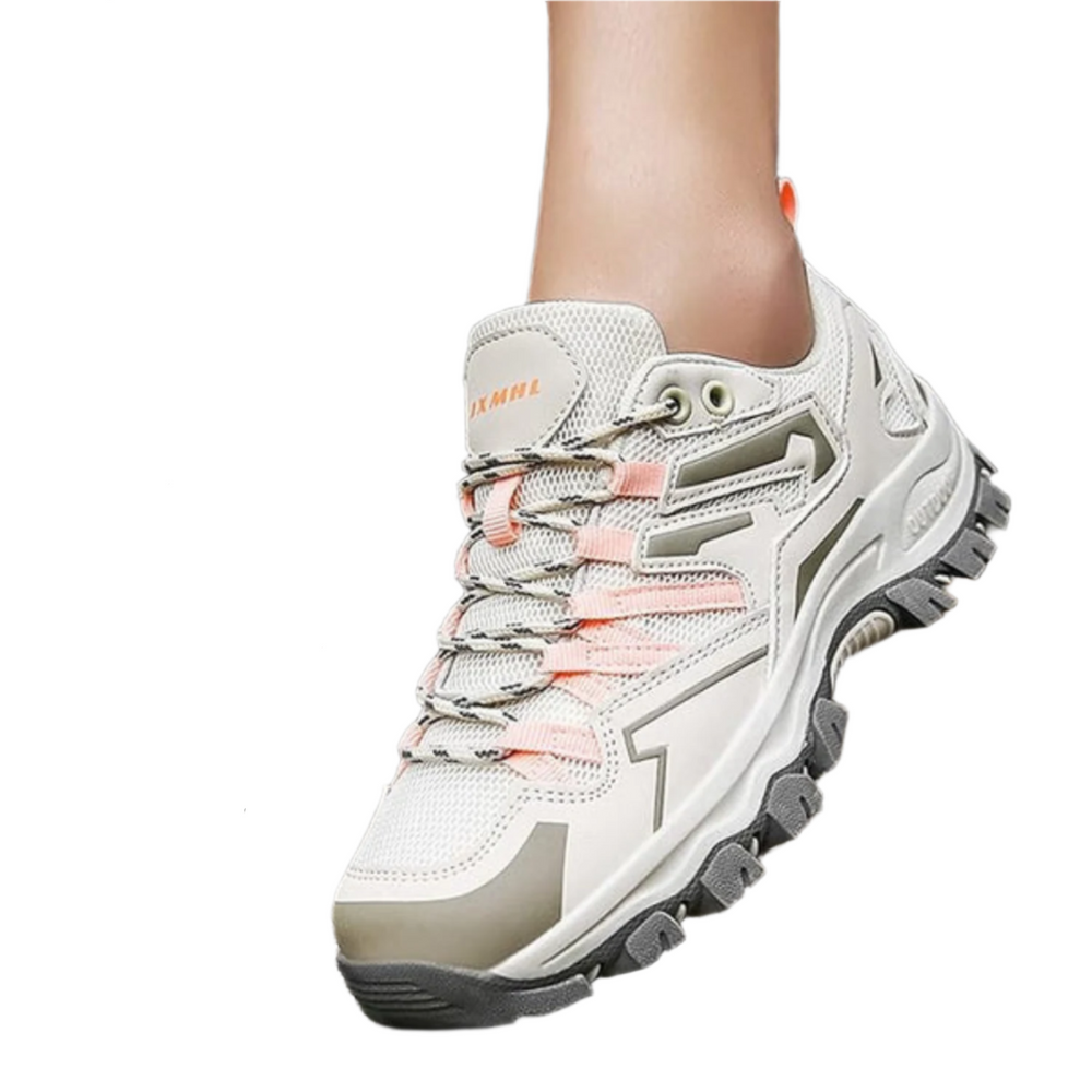 Dames wandelschoen paars-roze, robuust design voor outdoor avonturen, waterafstotend en ademend voor comfort.