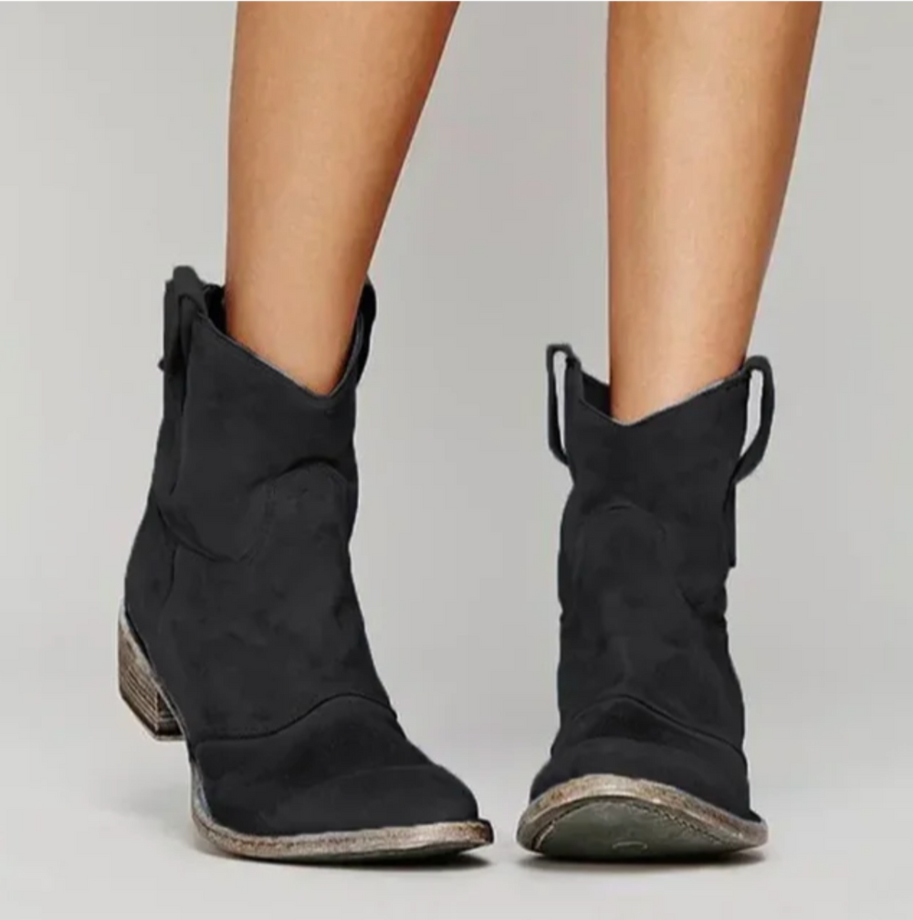 Zwarte dames westernlaarzen, comfortabel en stijlvol. Perfect voor casual of elegante outfits in de winter.