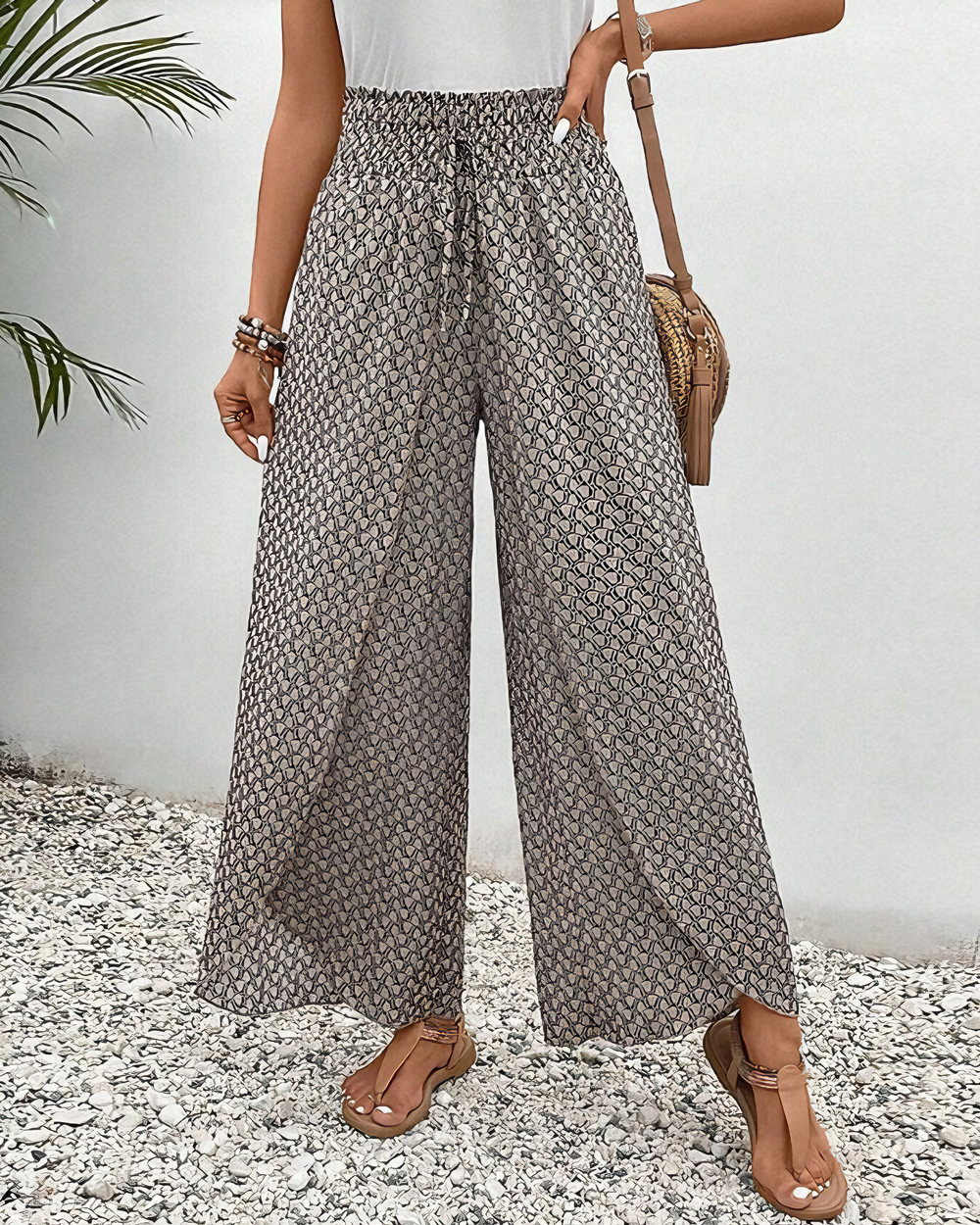 Casual zomerbroek voor dames met wijde pijpen, geometrisch patroon en elastische taille.