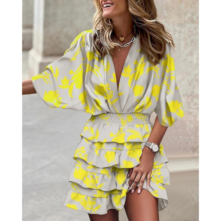 Comfortabele casual dames zomerjurk met V-hals en losse vleermuismouwen, ideaal voor warme dagen.
